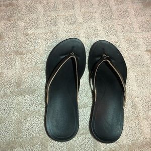 OluKai “Ho Opio” Black Flip Flops